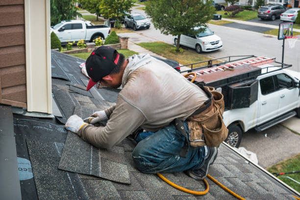 Professional Roofing technician working in Mapleville, RI